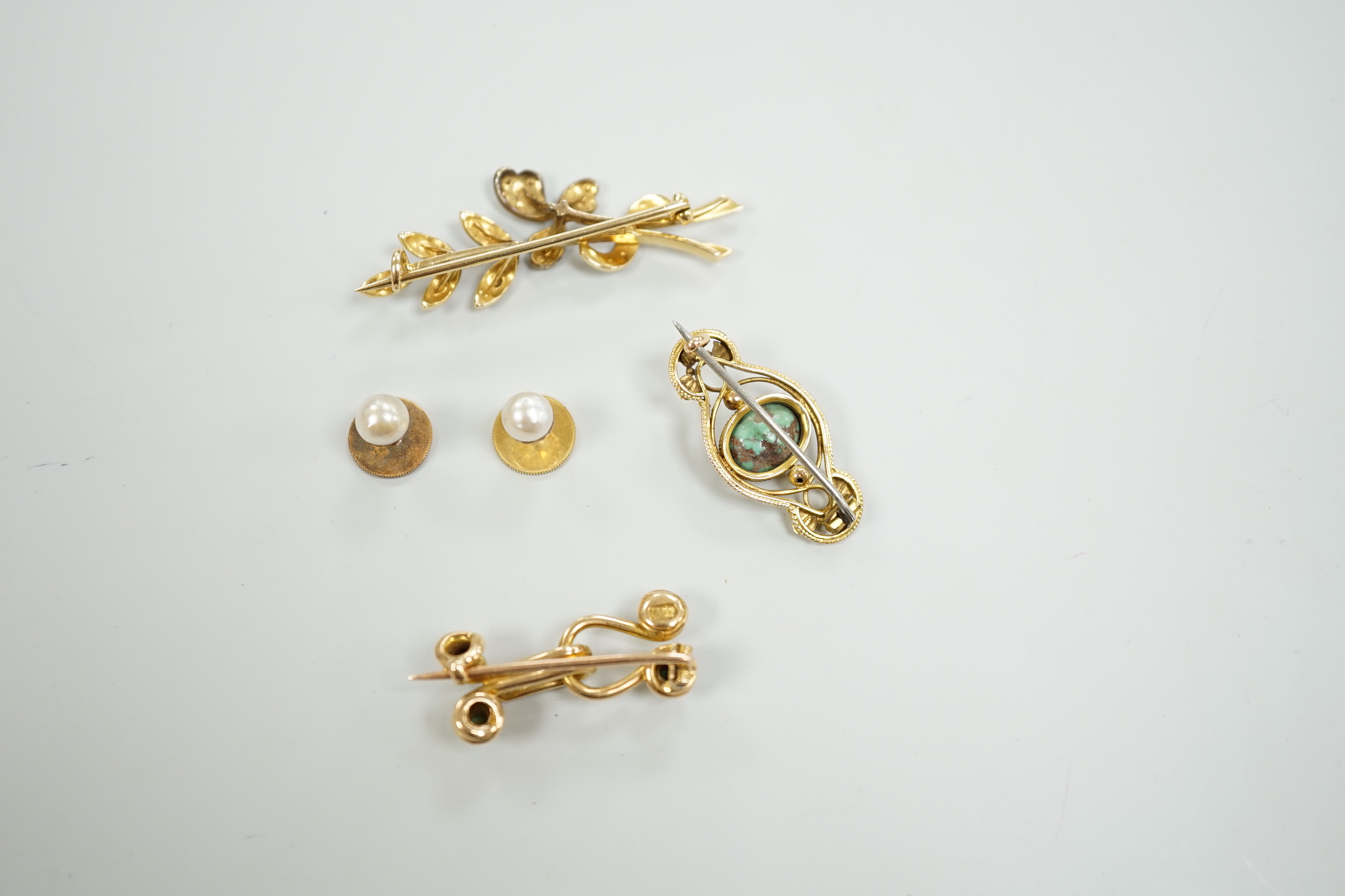 An Edwardian 15ct and seed pearl cluster set spray brooch, 47mm, a 15ct and four stone turquoise set brooch, one other yellow meta and turquoise brooch and a pair of 9ct and cultured pearl set dress studs.